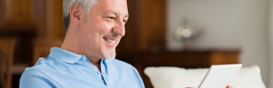 Man looking at tablet